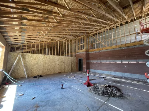 BLU-D framing interior view of sheathed trusses and walls, Hibbard Elementary