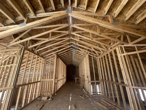 BLU-D framing fully sheathed roof and exterior walls viewed from inside of Hibbard Elementary