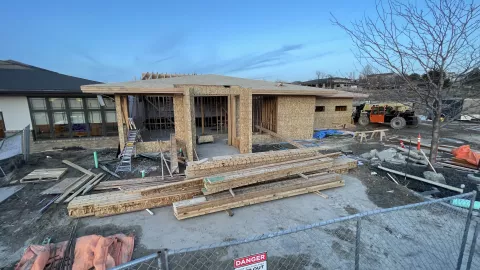 BLU-D framing exterior view of framed and sheathed addition to Pocatello Children's Clinic