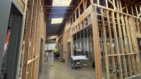 BLU-D Framing Interior view of framed in rooms with skylights in hall of Pocatello Children's Clinic