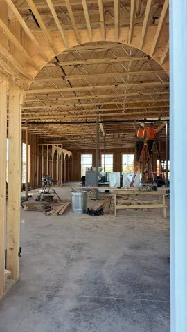 Interior view from booth area showing open studs in top of archway.