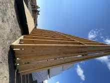BLU-D framing panelized walls with blue sky at Hibbard Elementary